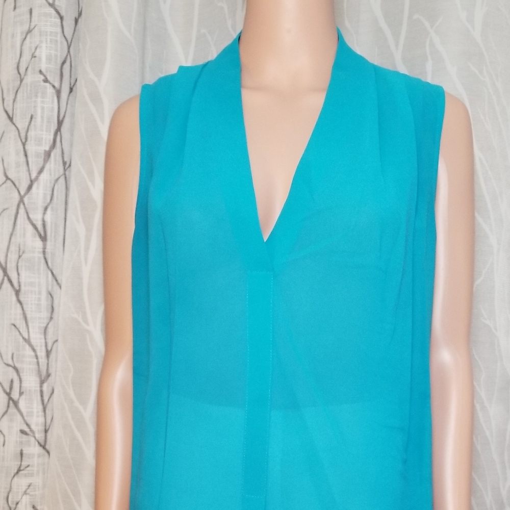 Used sleeveless blouse